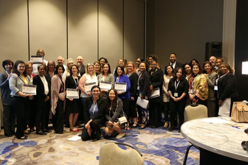 Ambassadors posing with their certificates at the national training in 2018.